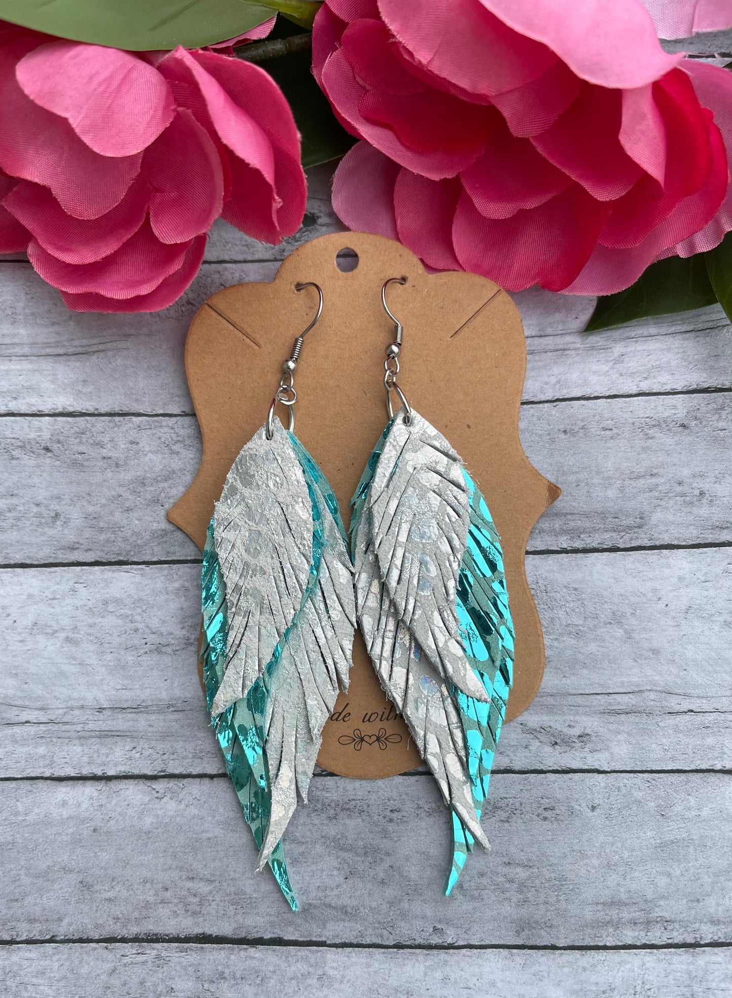 3.5” Iridescent White and Teal Leopard Feather Earrings